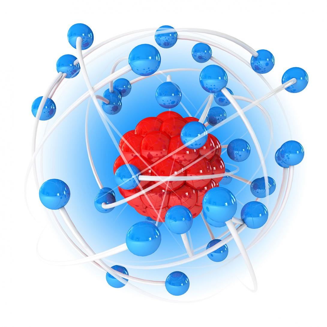 Všechny jaderné reakce se odehrávají v atomovém jádru – červená, hodně zvětšená část atomu (Zdroj: © kharlamova_lv / stock.adobe.com)